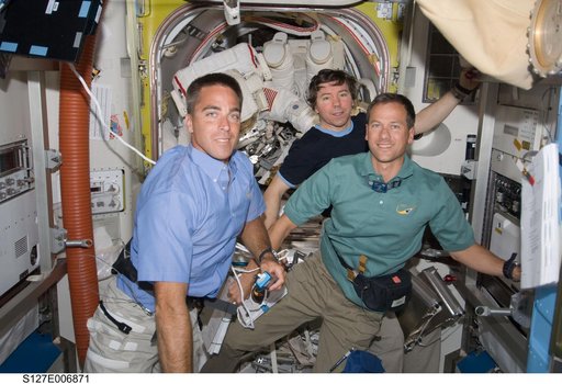 Cassidy, Marshburn and Barratt in the A/L during STS-127 / Expedition 20 Joint Operations