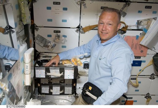 Hurley in the FWD MDDK during STS-127 / Expedition 20 Joint Operations