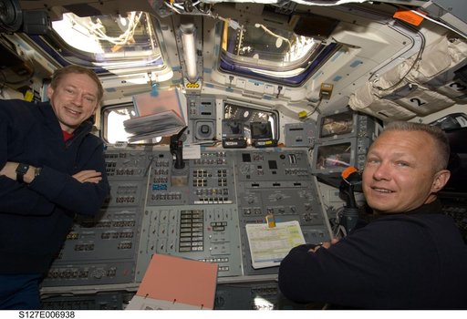 De Winne and Hurley in the aft FD during STS-127 / Expedition 20 Joint Operations