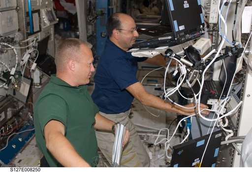 Hurley and Polansky at the JEMRMS in the JEM during Joint Operations