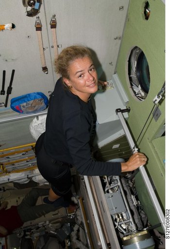 Payette looks out window in the SM during Joint Operations