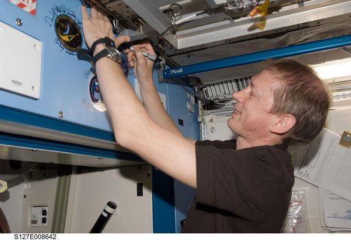 De Winne signs mission decal in the JEM during Joint Operations