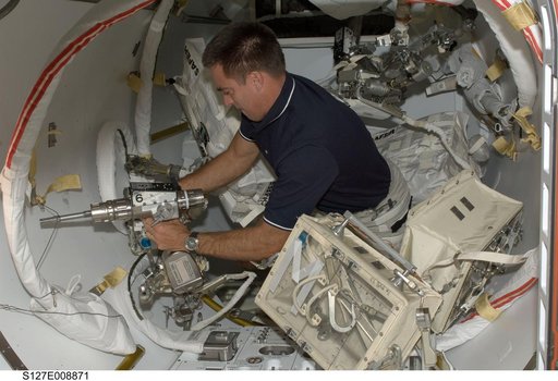Cassidy works with EVA Tools in the A/L during Joint Operations