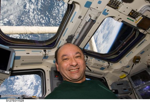 Polansky poses for photo in the aft FD of STS-127 Space Shuttle Endeavour
