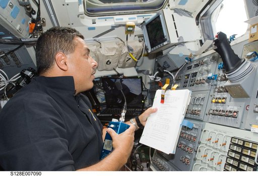 Hernandez on AFT Flight Deck (FD) at Remote Manipulator System (RMS) controls