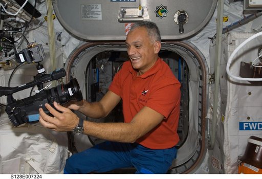 Olivas in European Laboratory Columbus with Video Camera