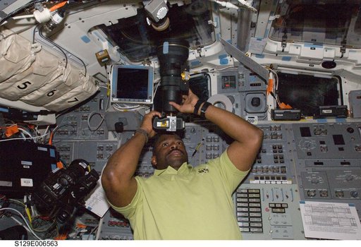 STS-129 MS1 Melvin takes a photo through a FD Window