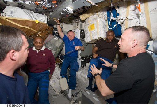 STS-129 Crew Members on the Middeck