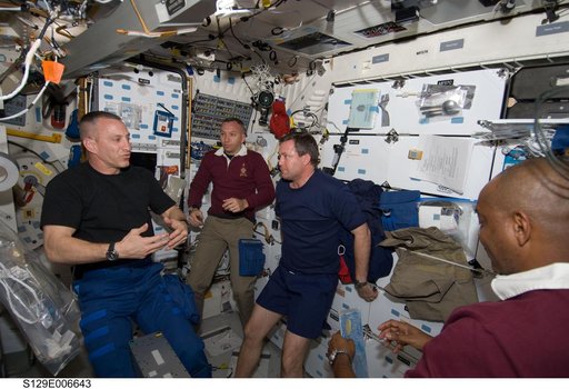 STS-129 Crew Members on the Middeck