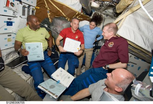 View of Expedition 21/STS-129 Crew Members on the Shuttle Atlantis Middeck