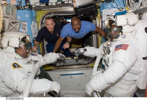 STS-129 Crew Members pose for a photo prior to EVA1