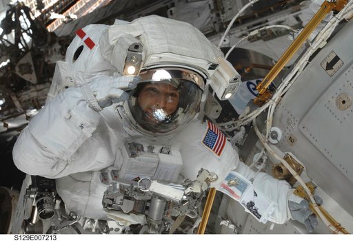 STS-129 MS2 Bresnik poses for a photo during EVA2
