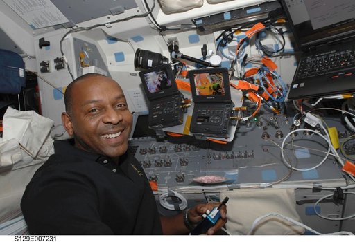 STS-129 MS4 Satcher poses for a photo