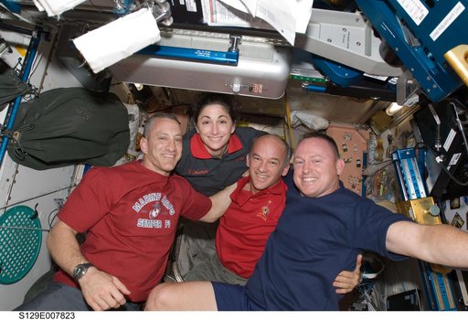 STS-129/Expedition 21 Crew Members posing for a photo on the ISS