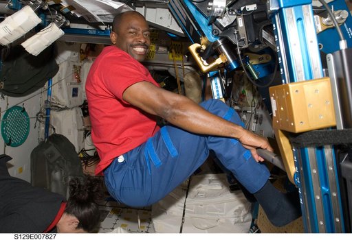 STS-129 MS1 Melvin exercises with the aRED