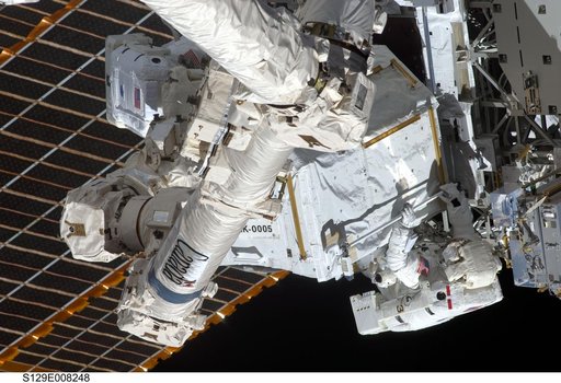 View of STS-129 MS2 Bresnik and MS4 Satcher during EVA3