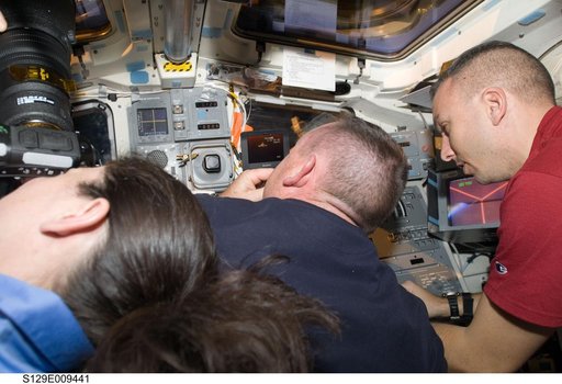 View of STS-129 Crew Members on the Atlantis Flight Deck