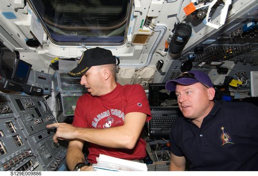 STS-129 Crew Members on the Flight Deck