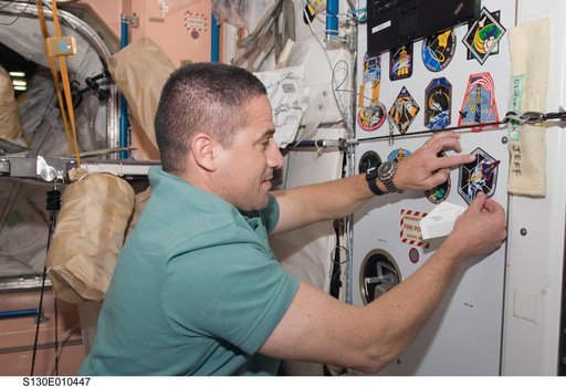 Zamka Places STS-130 Mission Patch in Node 1