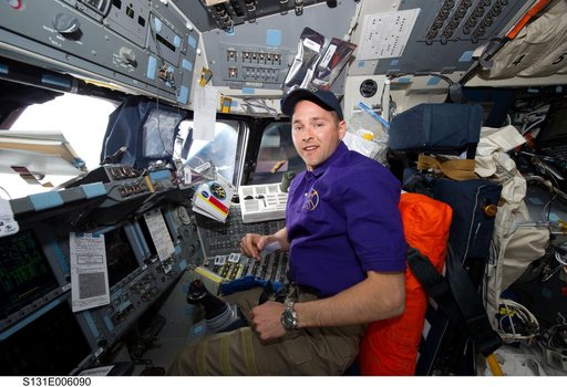 Dutton on Discovery flight deck