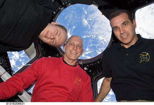 Astronauts pose in Cupola