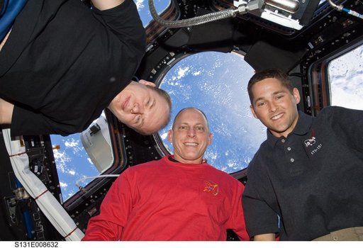 Astronauts pose in Cupola