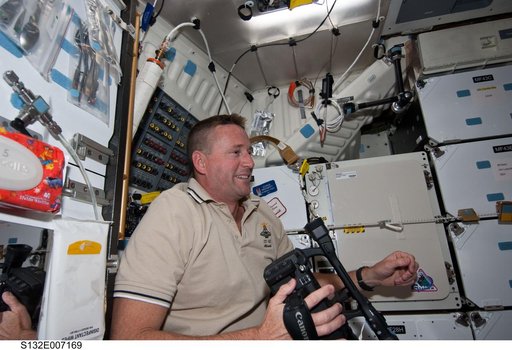 Ham records video in the FWD MDDK during STS-132