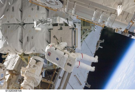 Bowen works with the Battery ORUs during EVA 1