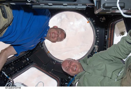 Antonelli and Reisman in the Cupola during Joint Operations