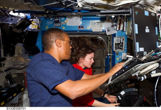 Drew and Coleman at SSRMS workstation