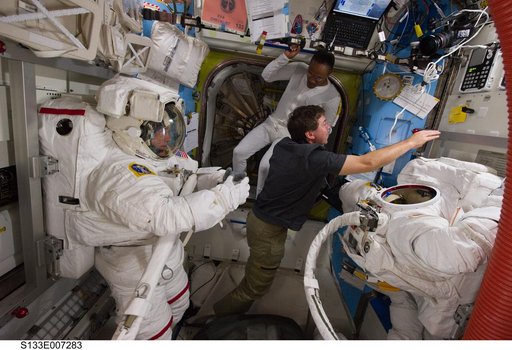 STS-133 crewmembers in Airlock