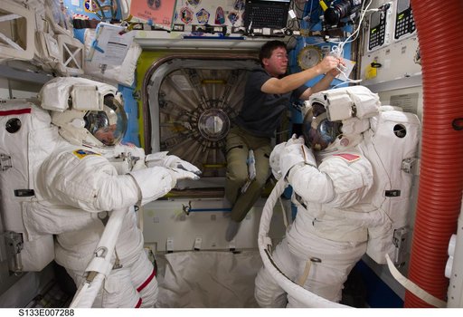 STS-133 crewmembers in Airlock