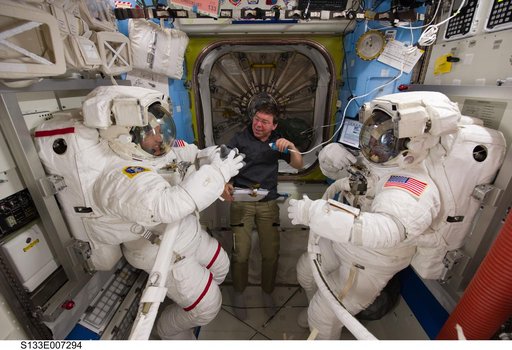 STS-133 crewmembers in Airlock