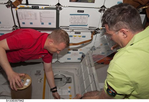 Boe and Bowen on Middeck with LiOH canisters