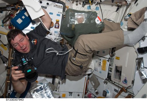 Barratt on Middeck with camera