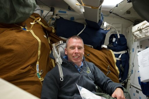 View of STS-134 MS Feustel on the Shuttle Middeck