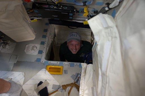 View of STS-134 MS Fincke posing for a photo