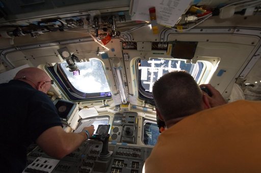 View of STS-134 Crew Members on the Flight Deck