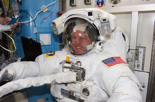 STS-134 MS Fincke posing for a photo prior to EVA-2