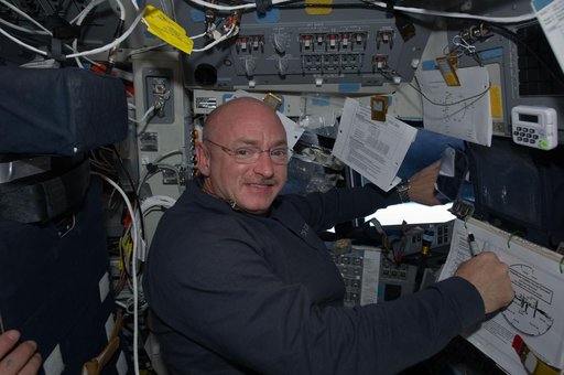 STS-134 Commander Kelly poses for a photo on the Flight Deck