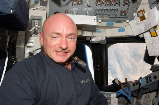 STS-134 Commander Kelly poses for a photo on Flight Deck
