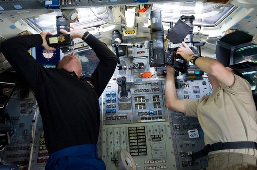 Ferguson and Walheim on Atlantis Aft Flight Deck during Rendezvous OPS