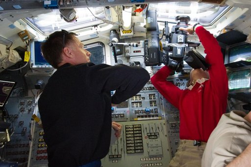 Ferguson and Magnus on Atlantis Aft Flight Deck during Rendezvous OPS