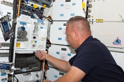 Hurley Prepares a Meal on Atlantis Middeck