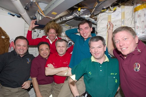 Group Photo during All-American Meal on Atlantis Middeck