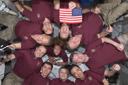 In-Flight Portrait of STS-135 and Expedition 28 Crews in Kibo