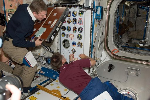 Ferguson Places STS-135 Mission Patch in Node 1
