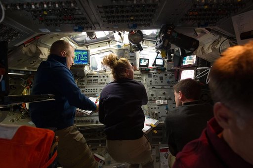 Crewmembers on Flight Deck during Undocking OPS