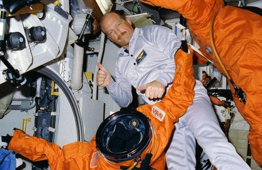 STS-26 Commander Hauck with launch and entry suits (LESs) on OV-103's middeck