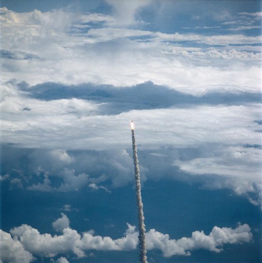 STS-26 Discovery, OV-103, distant air-to-air launch views